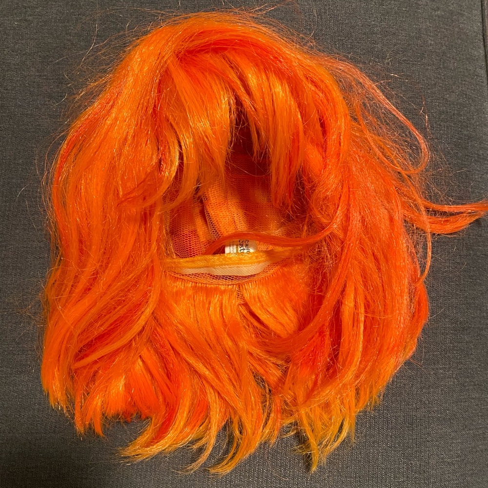 Orange wig with bangs , short hair